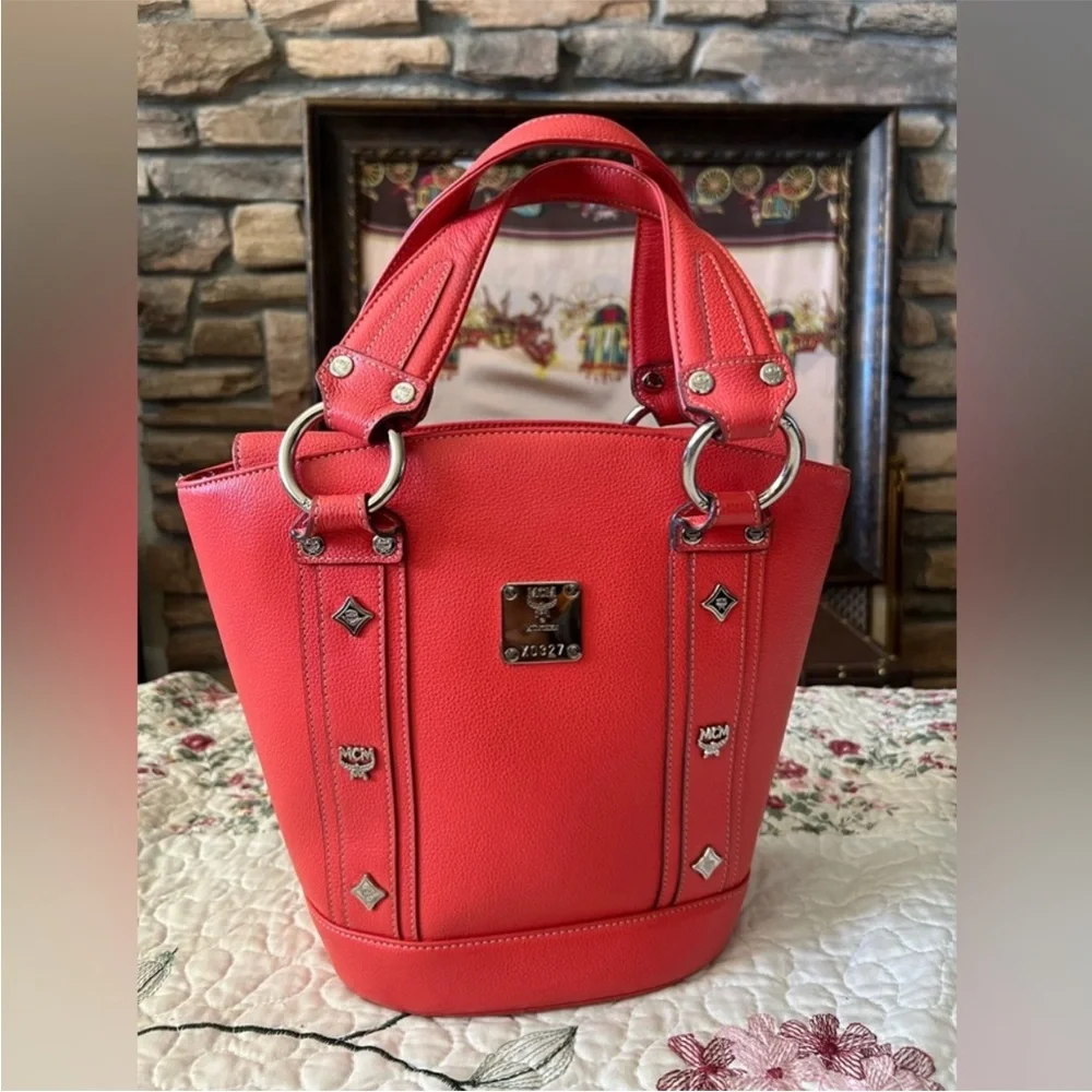 MCM BUCKET SATCHEL In Excellent Used Condition.   Absolutely Beautiful Firey Red